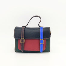 Cargar imagen en el visor de la galería, Bolso Satchel de piel de colores OSLO de LaNievina. Multicolor, cerrado con clips y varios compartimentos. ASa corta para mano y larga para bandolera. Frontal
